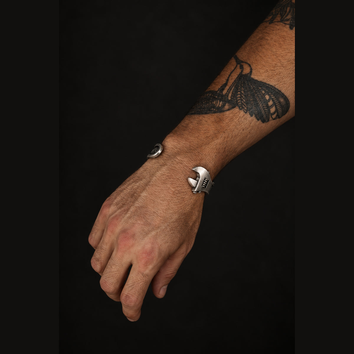 Sterling silver Wrench Cuff Bracelet worn on the wrist front view