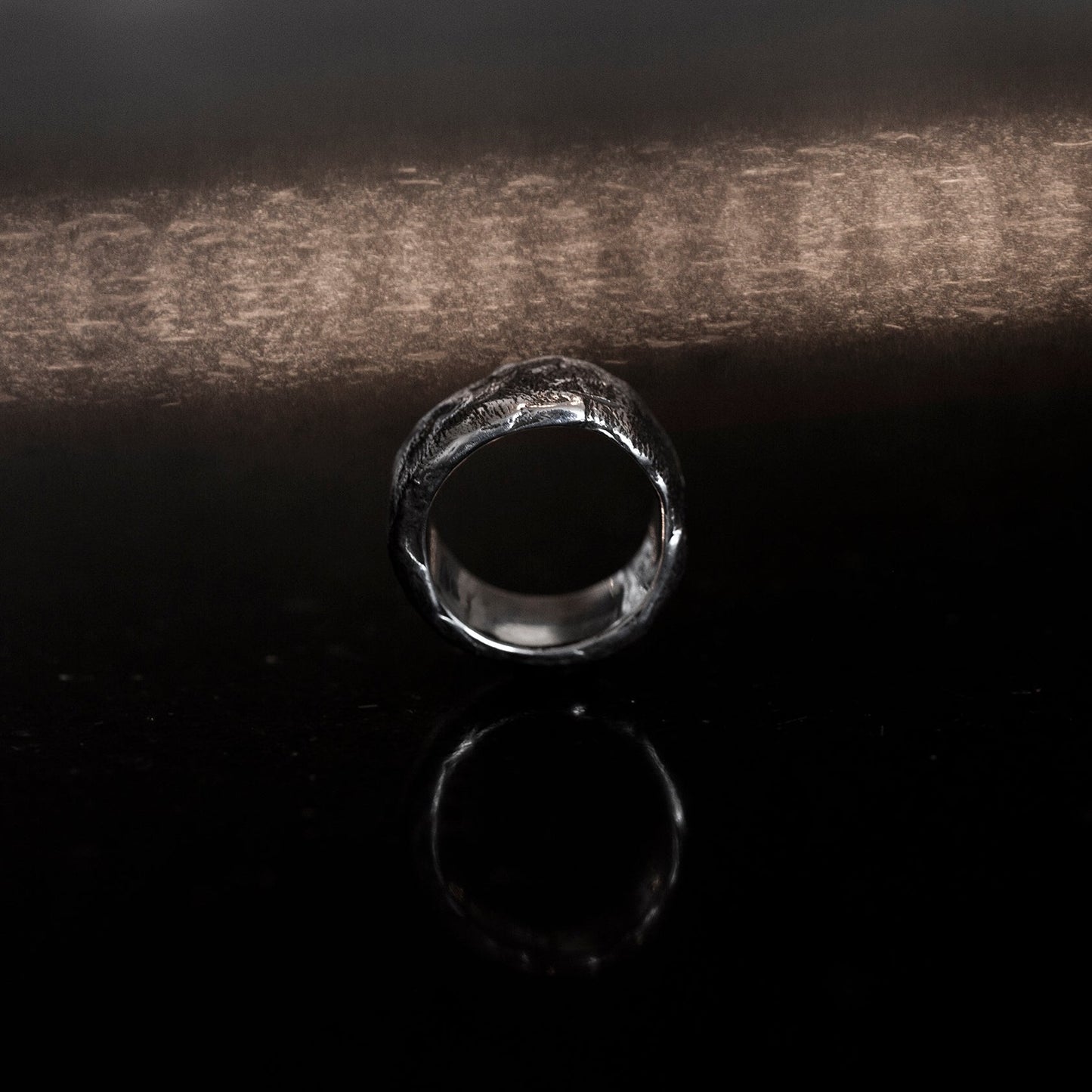 Fingerprint textured ring