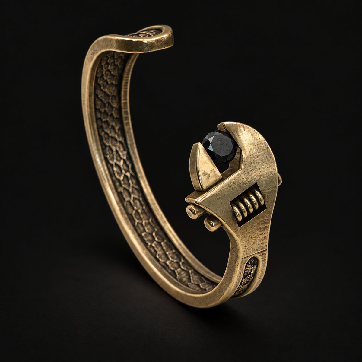 Brass Wrench Cuff Bracelet with a round black diamond, three-quarter view