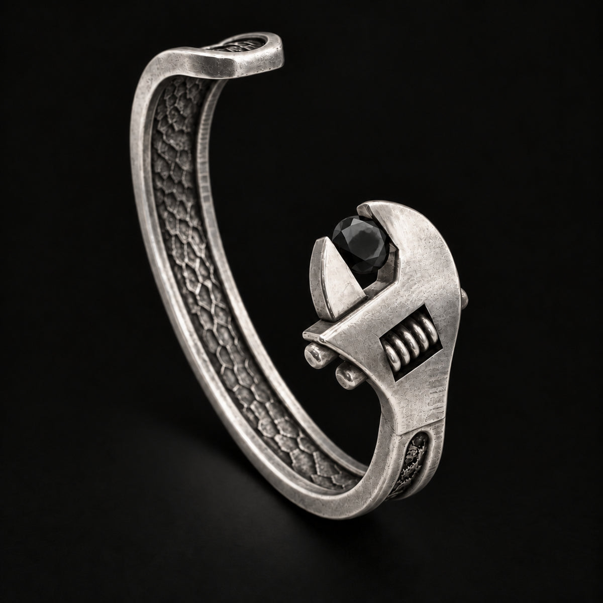 Sterling silver Wrench Cuff Bracelet with a black diamond, three-quarter view